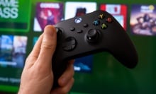 Xbox controller with Xbox Game Pass in the background