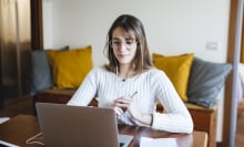 woman using computer for online learning