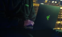 Person using a Razer Blade 15 gaming laptop