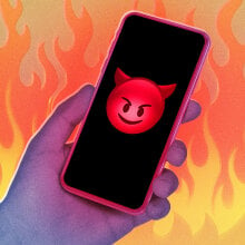 An illustration of an iPhone 15 in a field of flames with a devil emoji displaying on the screen.