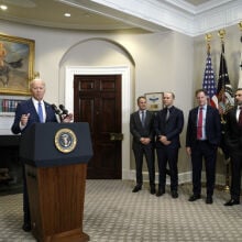 President Biden in the Roosevelt Room of the White House next to AI company executives 