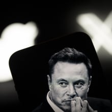 Elon Musk with X and Twitter logos