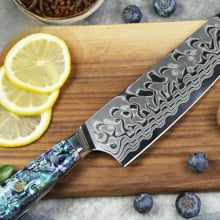 Ryori knife on cutting board
