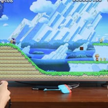 two people playing Super Mario