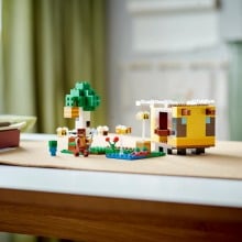a minecraft lego set with bee scene on a table