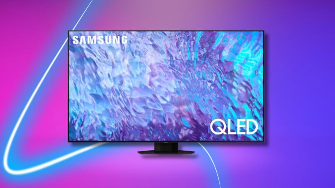 Samsung QLED TV with abstract water screensaver on pink and blue background